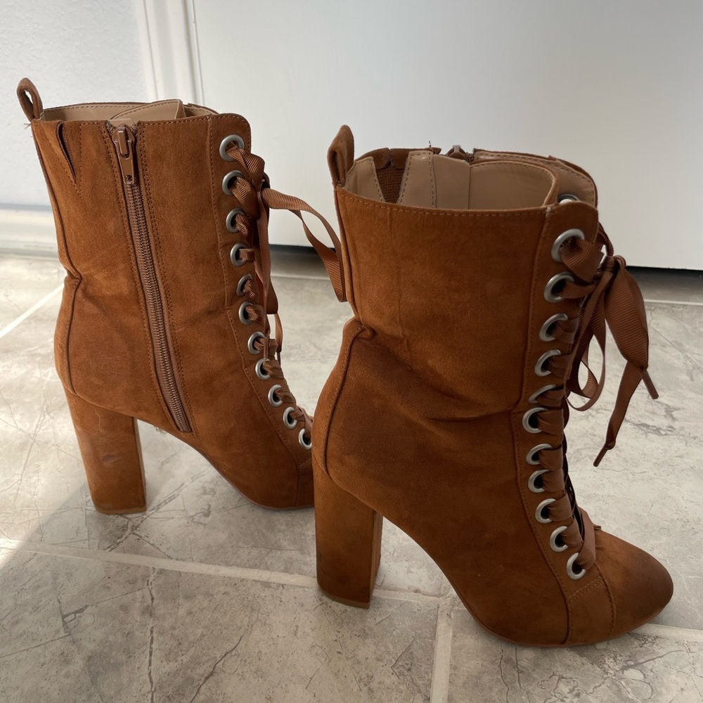 Super cute high heeled boots! Only worn a few times.